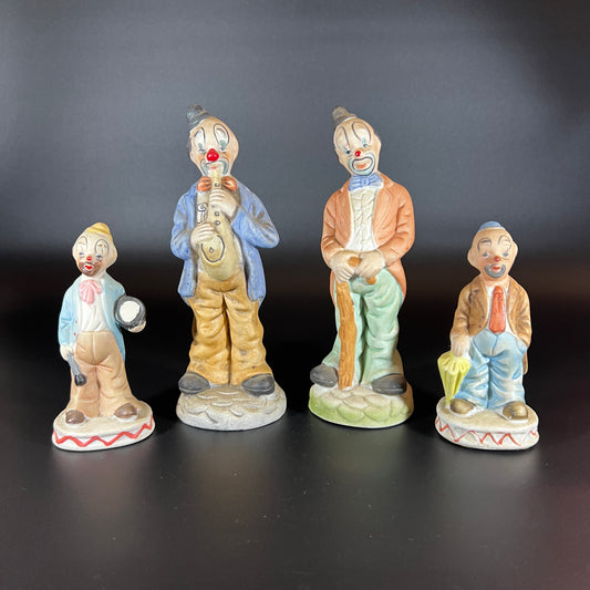 Vintage Set of 4 Hand-Painted Porcelain Clown Figurines