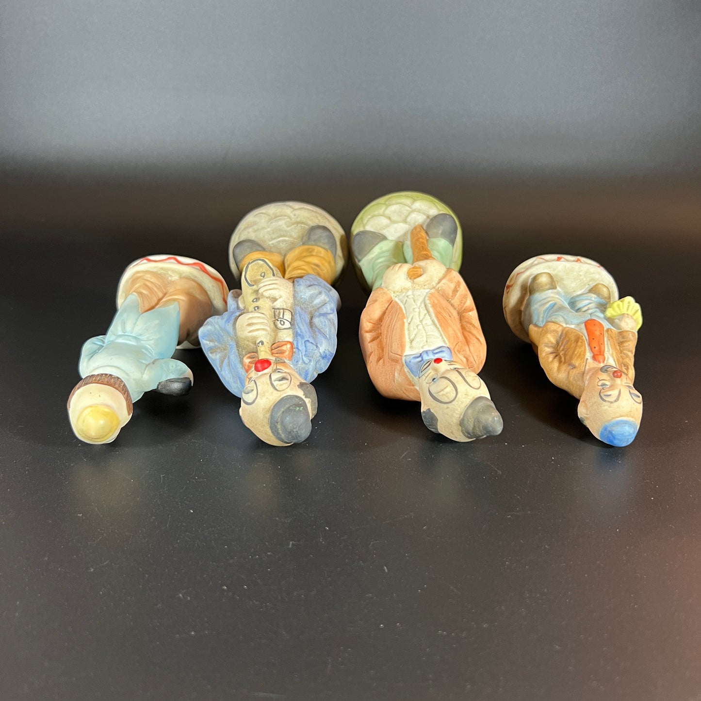 Vintage Set of 4 Hand-Painted Porcelain Clown Figurines