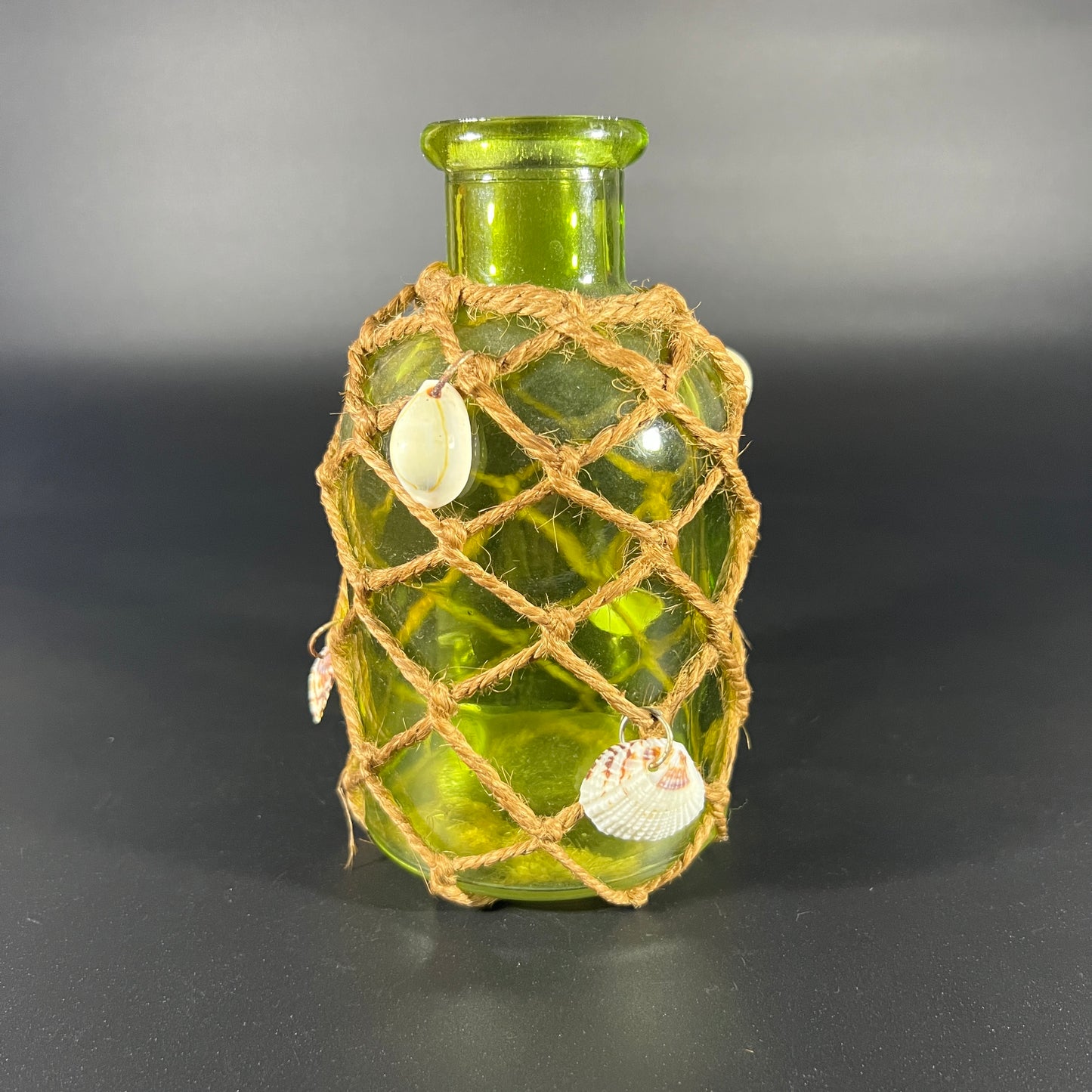 Green Bottle with Net and Shells