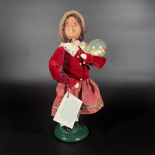 Byers Choice Doll - Girl with Snow Globe and Red Jacket
